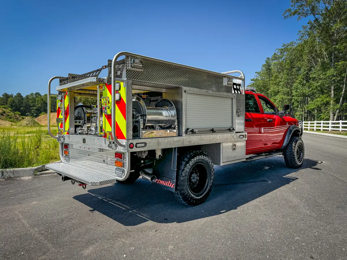 Right-side profile view with side body compartments and rear wheel.